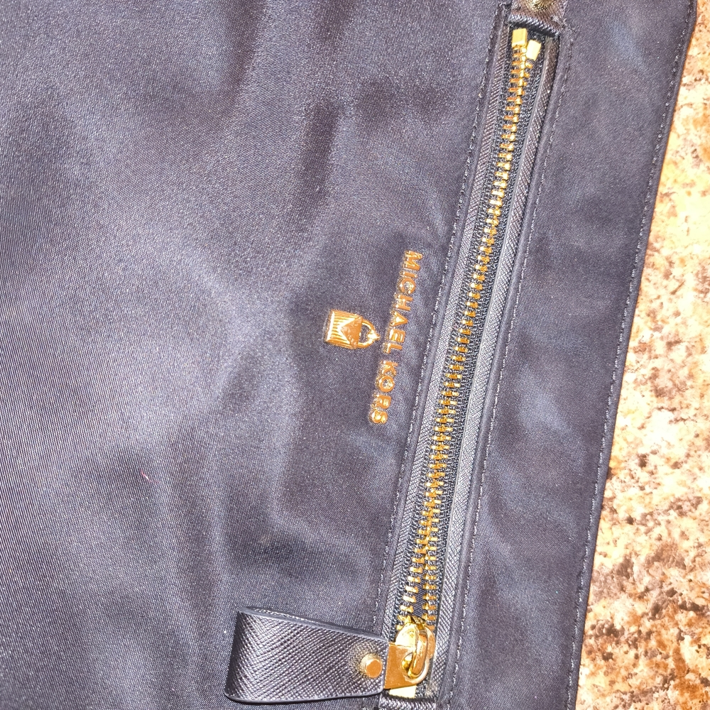 Michael Kors Black Bag with Gold Accents